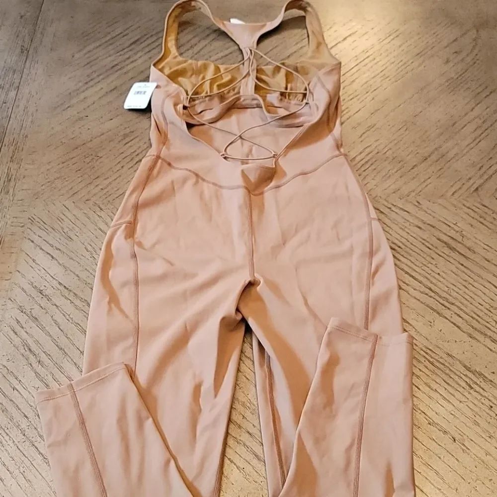 Free people NWT size small blush jumpsuit